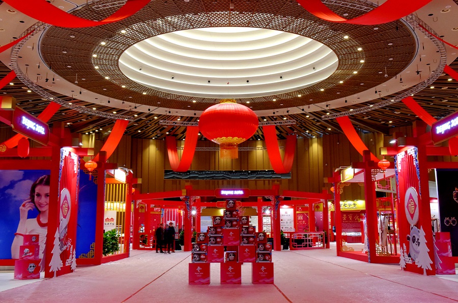 big red latern and booths with red decor at Yanqi Lake Exhibition at the Beijing 2022 Winter Olympics